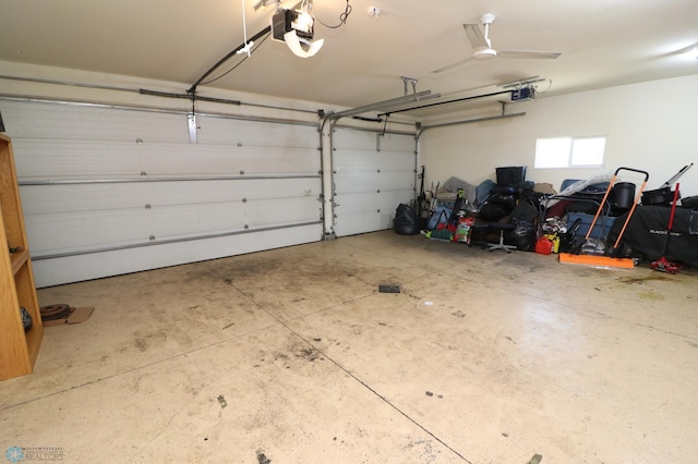 garage featuring a garage door opener and ceiling fan