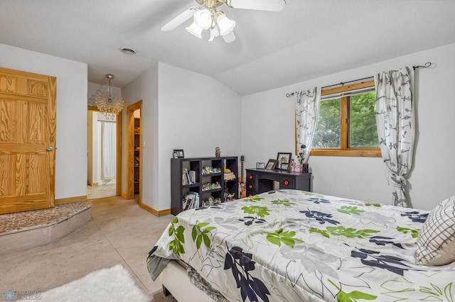 bedroom with lofted ceiling and ceiling fan