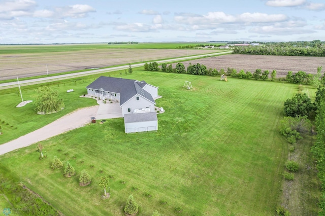 birds eye view of property with a rural view