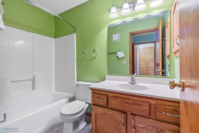 full bathroom featuring tile floors, washtub / shower combination, vanity, and toilet