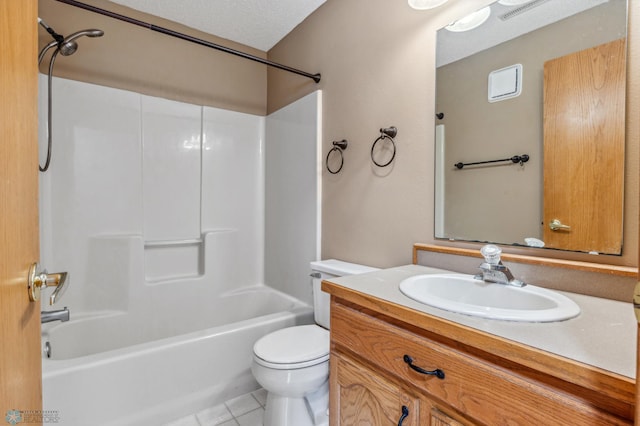 full bathroom with a textured ceiling, tile floors, shower / bathing tub combination, vanity, and toilet