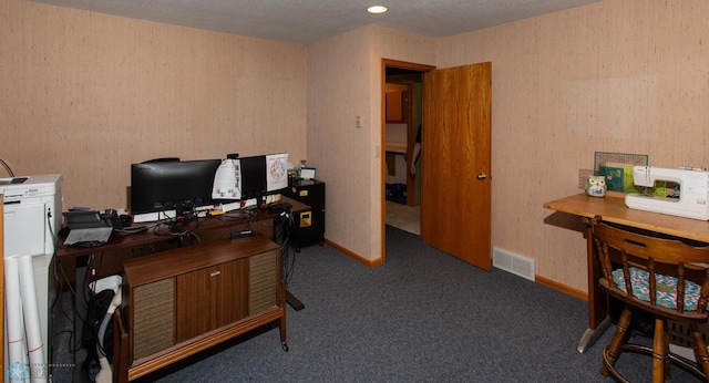 office space with carpet and a textured ceiling