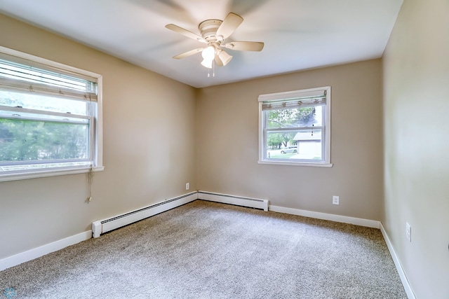 spare room featuring ceiling fan and carpet flooring