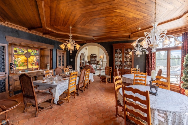 tiled dining space with a notable chandelier, a tray ceiling, and wood ceiling