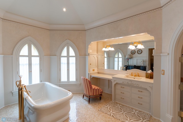 bathroom featuring tile flooring, vaulted ceiling, a bath to relax in, and vanity