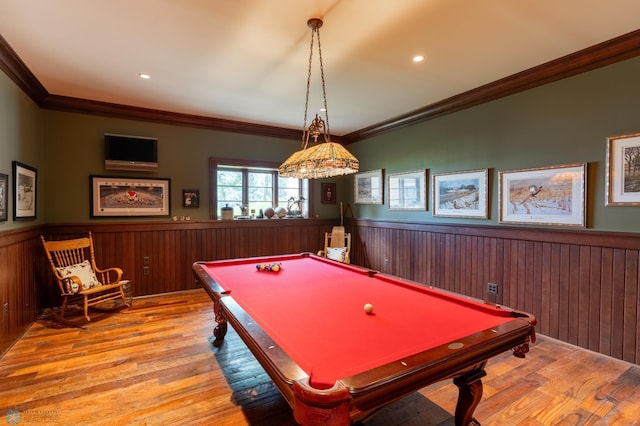 rec room with billiards, crown molding, and light wood-type flooring