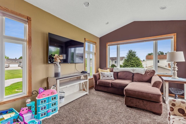 carpeted living room featuring vaulted ceiling