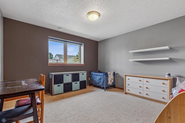 carpeted bedroom with a textured ceiling