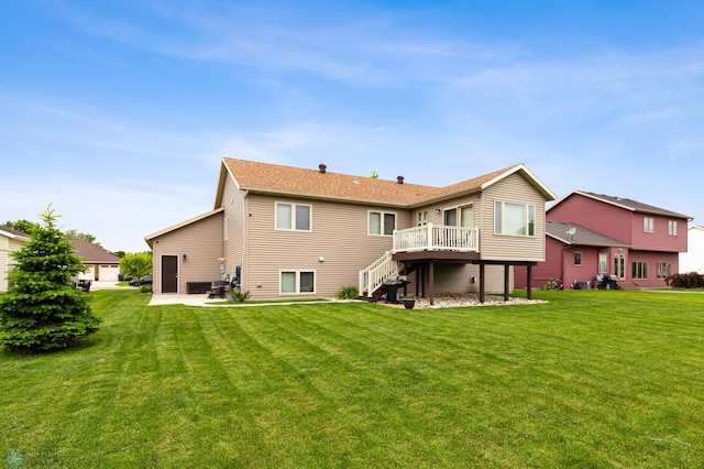 back of property featuring a patio and a yard