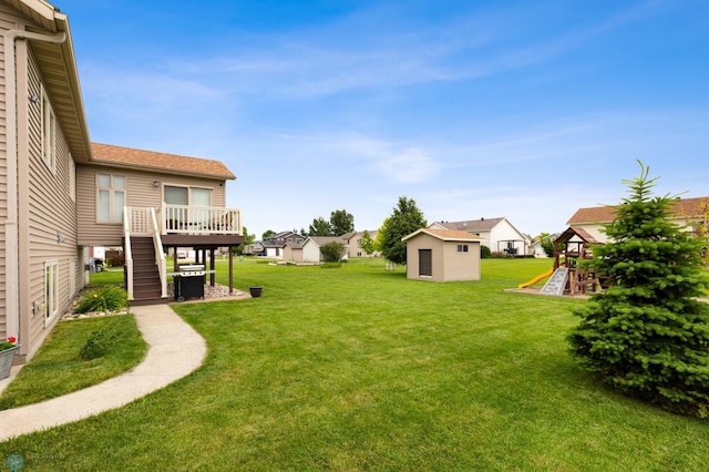 view of yard featuring a wooden deck