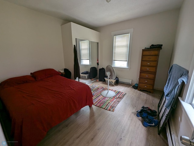 bedroom featuring hardwood / wood-style floors