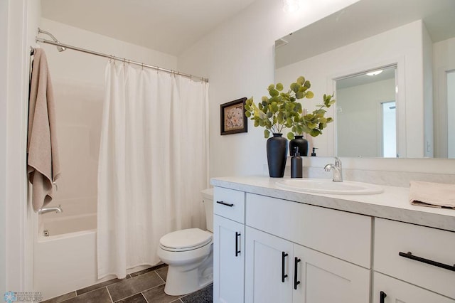 full bathroom with tile floors, shower / tub combo with curtain, toilet, and vanity with extensive cabinet space