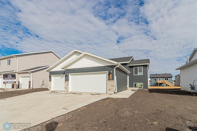 view of front of property featuring a garage