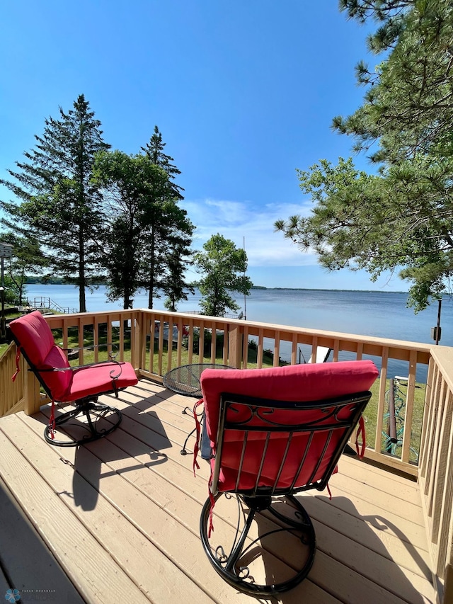 deck featuring a water view