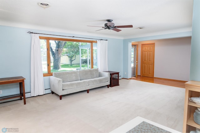 living room with ceiling fan