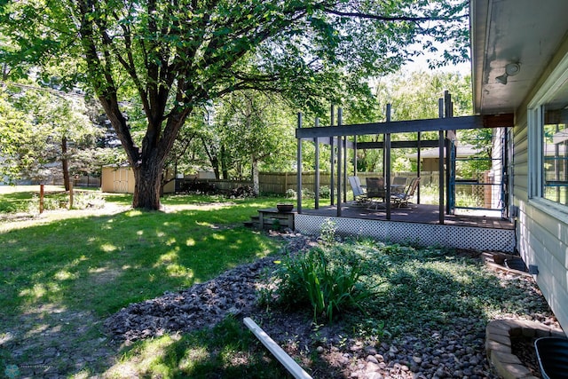 view of yard featuring a wooden deck