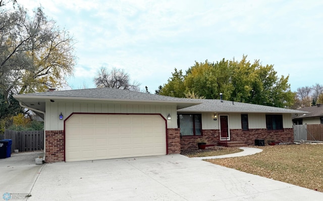 ranch-style home featuring a garage