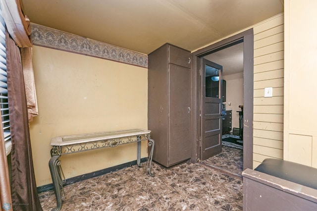 interior space featuring dark tile patterned floors