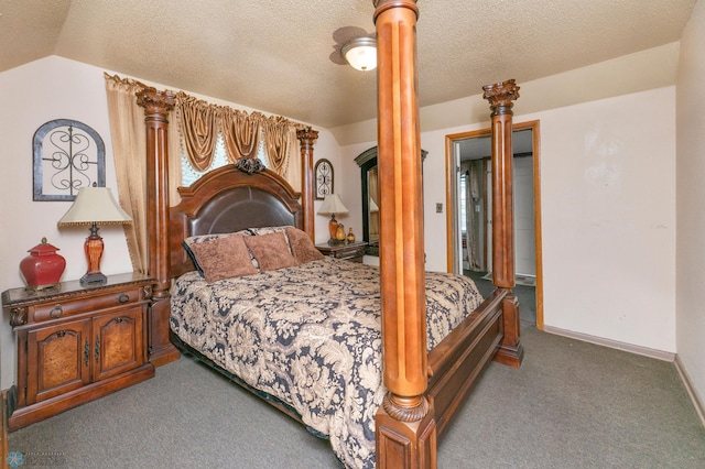 bedroom featuring ceiling fan, vaulted ceiling, carpet floors, and a textured ceiling