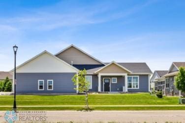 view of front of home featuring a front lawn