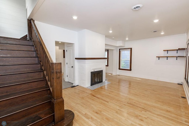 living room with light hardwood / wood-style flooring