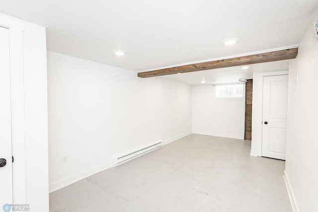 basement featuring a baseboard heating unit