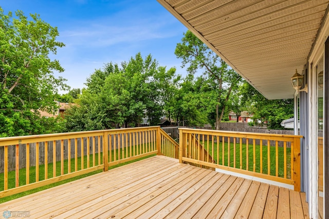 deck featuring a yard