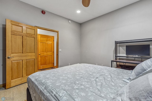 carpeted bedroom with ceiling fan