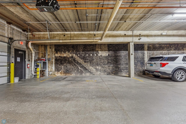 garage featuring a carport and a garage door opener