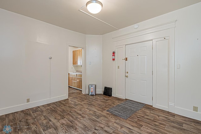 entryway featuring dark hardwood / wood-style floors