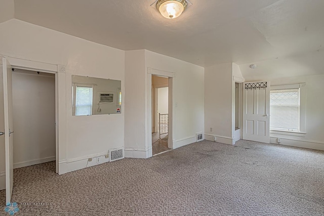 unfurnished bedroom featuring a closet and carpet floors