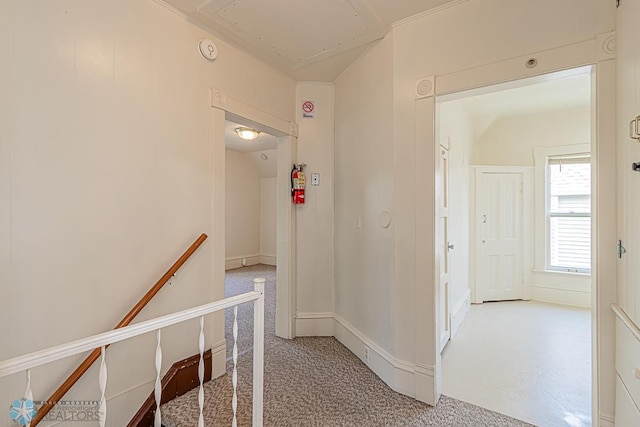 corridor with carpet flooring