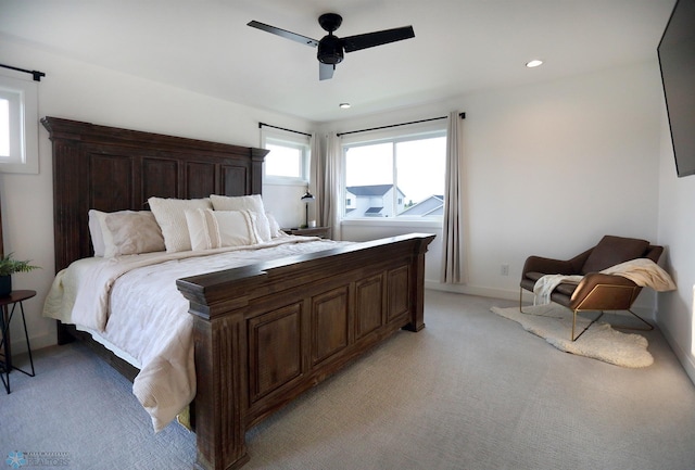 carpeted bedroom with ceiling fan