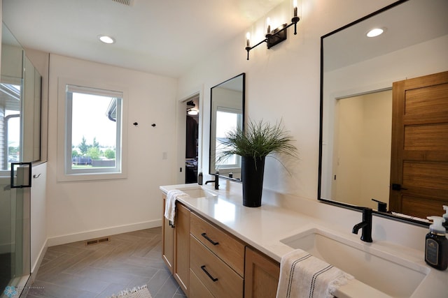 bathroom with dual bowl vanity