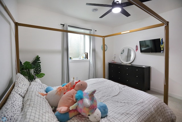 carpeted bedroom with ceiling fan