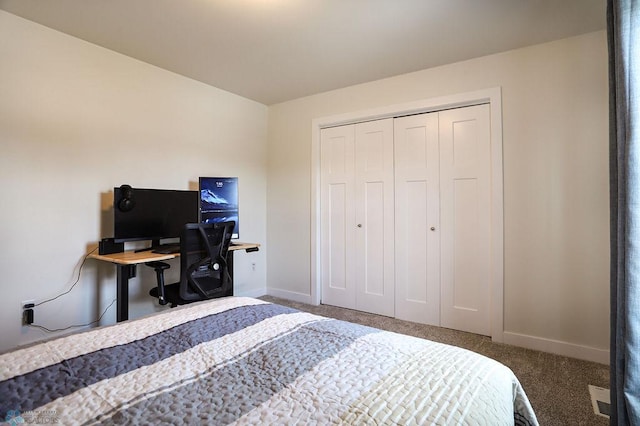 carpeted bedroom with a closet