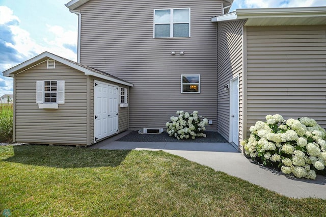 rear view of house with a lawn