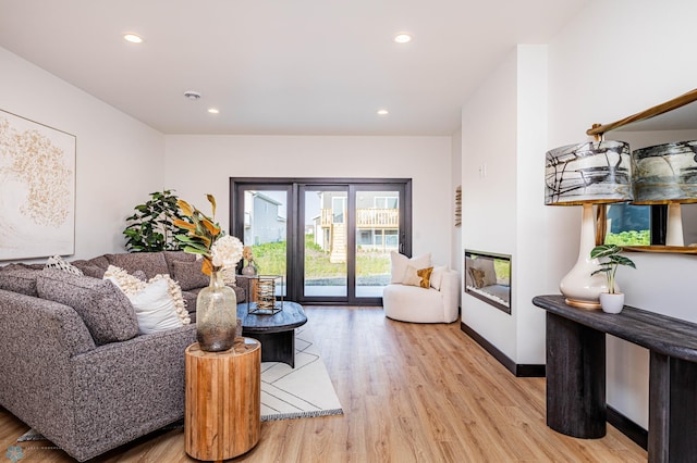 living room featuring light wood-type flooring