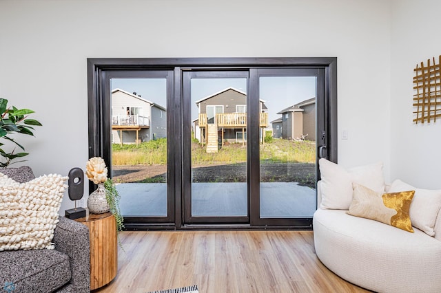 doorway with light hardwood / wood-style floors