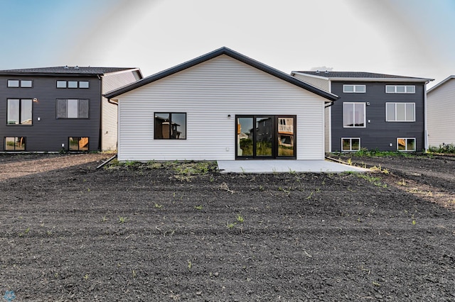 back of property featuring a patio area