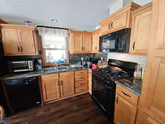 kitchen with backsplash, black appliances, dark hardwood / wood-style flooring, and sink