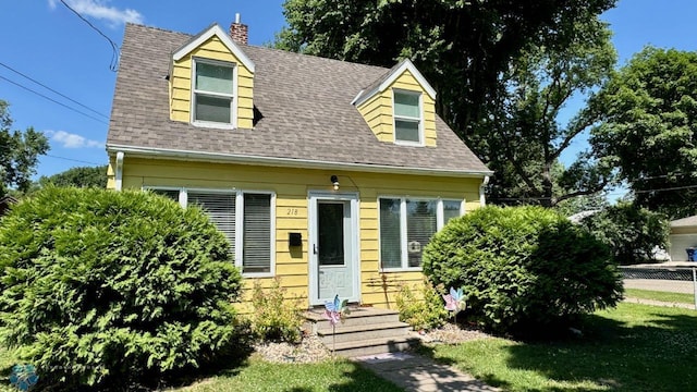 view of new england style home