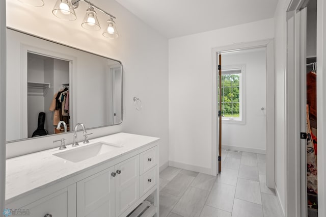 bathroom featuring vanity and tile patterned flooring