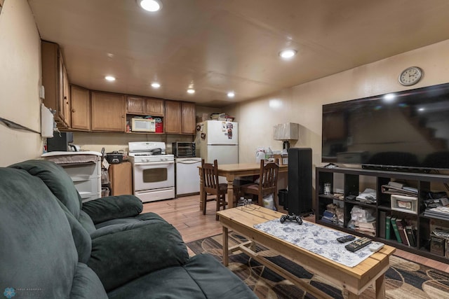 living room with light hardwood / wood-style floors