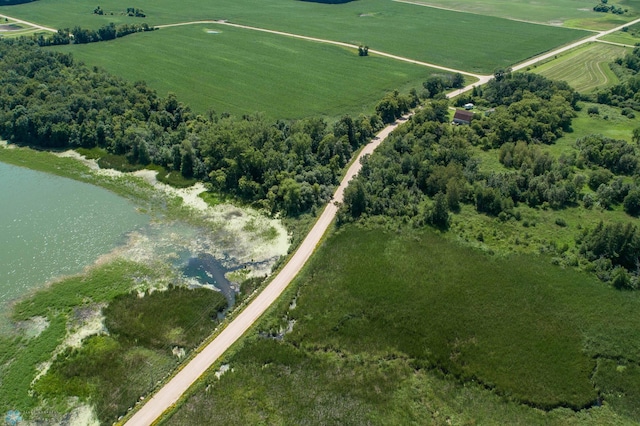 drone / aerial view featuring a water view and a rural view