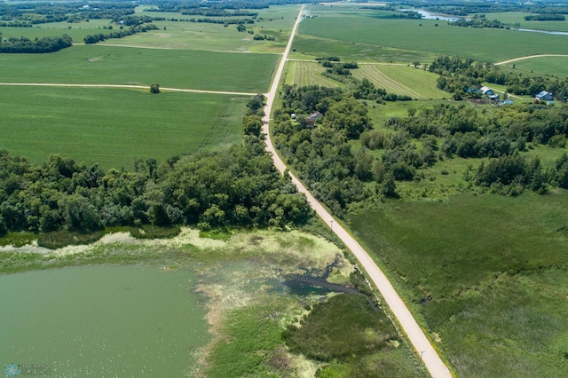 aerial view with a water view and a rural view