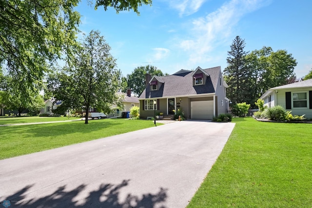 new england style home featuring a front yard and a garage