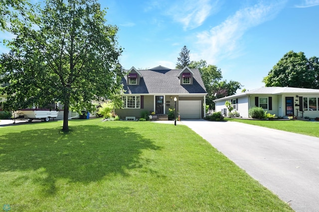 cape cod house featuring a front yard