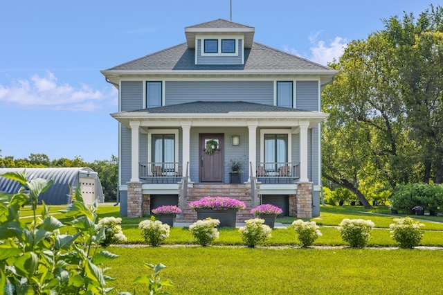 view of front facade featuring a porch and a front yard