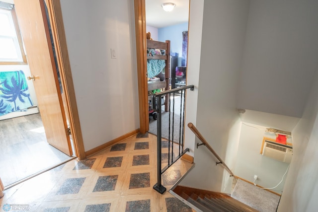 stairs featuring light tile patterned floors